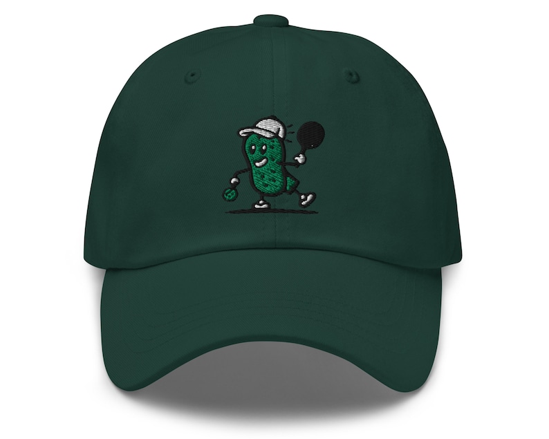 May include: A dark green baseball cap with an embroidered cartoon pickle playing tennis. The pickle is wearing a white hat and holding a green tennis racket.