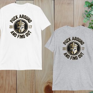two t - shirts with the words buck around and find out on them