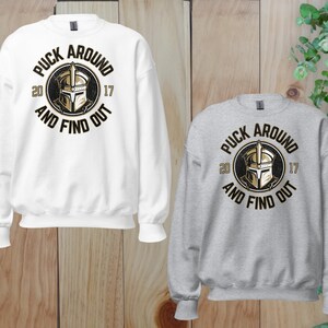 a pair of sweatshirts with the words pick around and find out