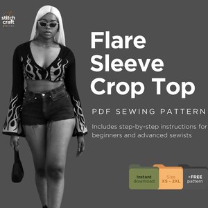 May include: A black and white photo of a woman wearing a black crop top with a flame design and black shorts. The text "Flare Sleeve Crop Top" is written in white on a gray background. The text "PDF Sewing Pattern" is written in white below the title. The text "Includes step-by-step instructions for beginners and advanced sewists" is written in white below the pattern description. The text "Instant download" is written in green on a green rectangle. The text "Size XS-2XL" is written in white on an orange rectangle. The text "+FREE pattern" is written in white on a brown rectangle.