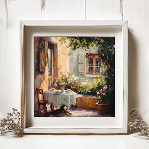 May include: A painting depicting a patio scene with a table set for two, surrounded by lush greenery and flowers. The table has a white tablecloth and two chairs. A window with a view of a garden is visible in the background.