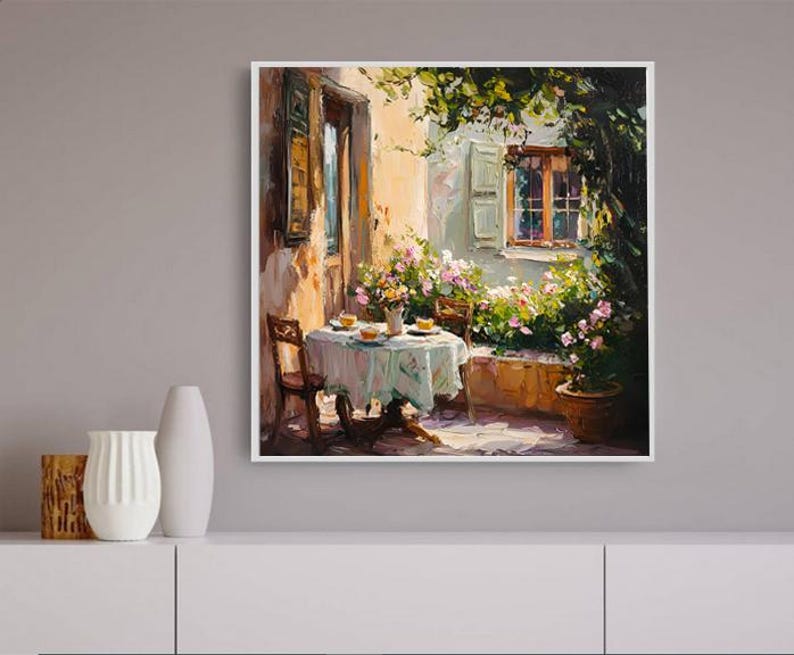 May include: A painting depicting a patio scene with a table set for tea, surrounded by lush greenery and flowers. The patio is next to a building with a window and a door. The painting is executed in a painterly style with vibrant colours.