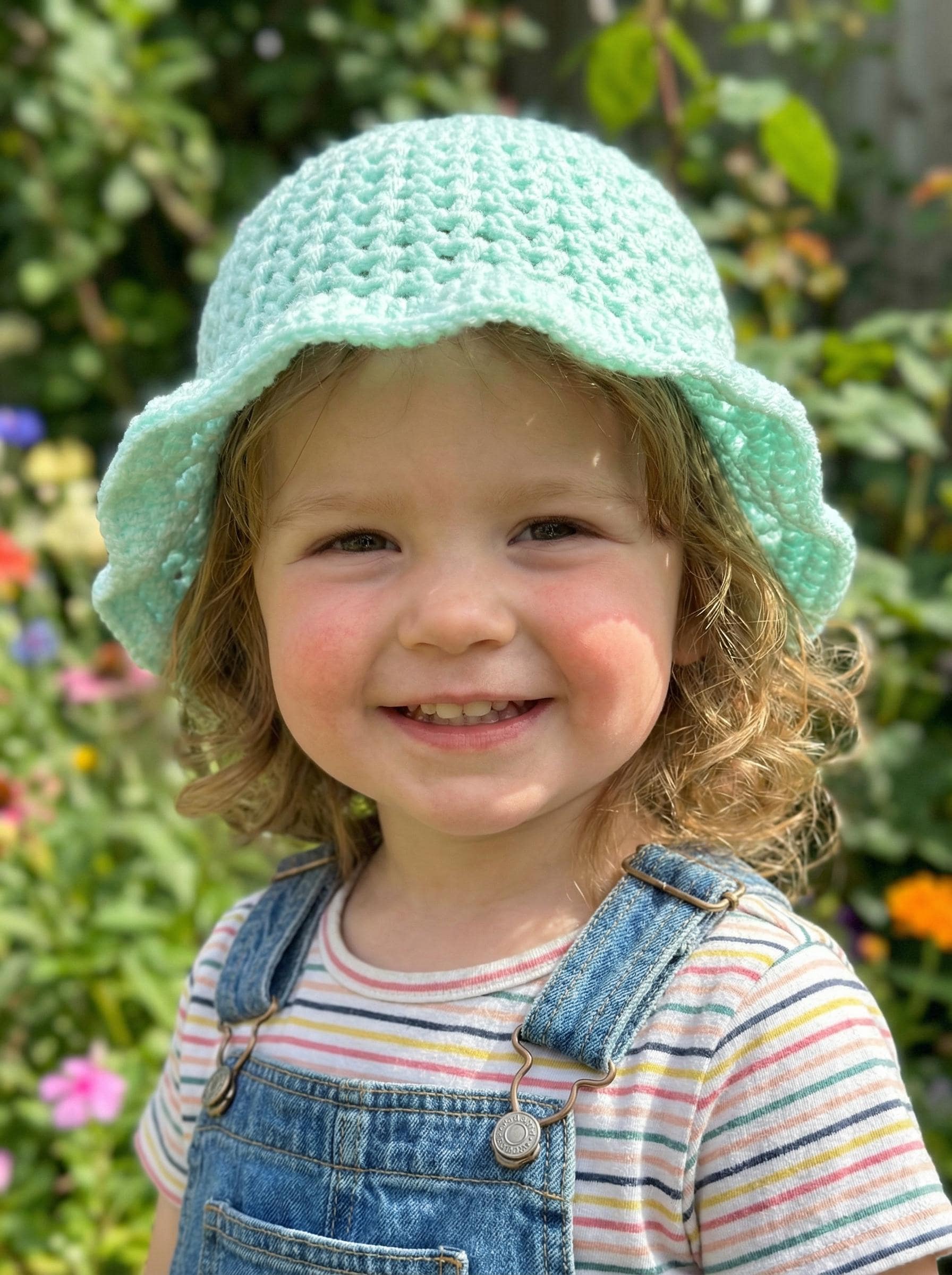 30 Ruffle Bucket Hat Crochet Patterns for Summer, Cottagecore, and Everyday Wear 27 Crochet Ruffle Bucket Hat Pattern for Baby and Toddler