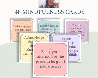 May include: 48 mindfulness cards with colorful backgrounds and inspirational phrases. The cards feature phrases like "Today's mantra: I am here, I am now", "Breathe in calm, exhale stress. You are in the present", "Feel the sensations of your breath, you are now", "Acknowledge thoughts without judgment", "Bring your attention to the present; let go of past worries", and "Inhale peace, doubt. Stronger think".