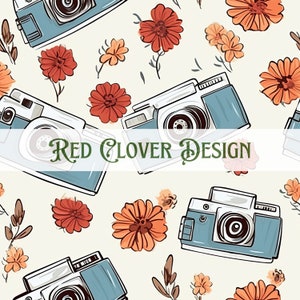 May include: A seamless pattern featuring vintage cameras and red clover flowers on a cream background. The cameras are blue and white with a black lens. The flowers are a deep red with yellow centers. The text "RED CLOVER DESIGN" is written in green cursive.