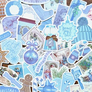 15 pegatinas azules de invierno. Adornos navideños, regalos, copos de nieve, el tradicional Papá Noel y mucho más para tarjetas navideñas, manualidades, diarios, scrapbooking, etc.