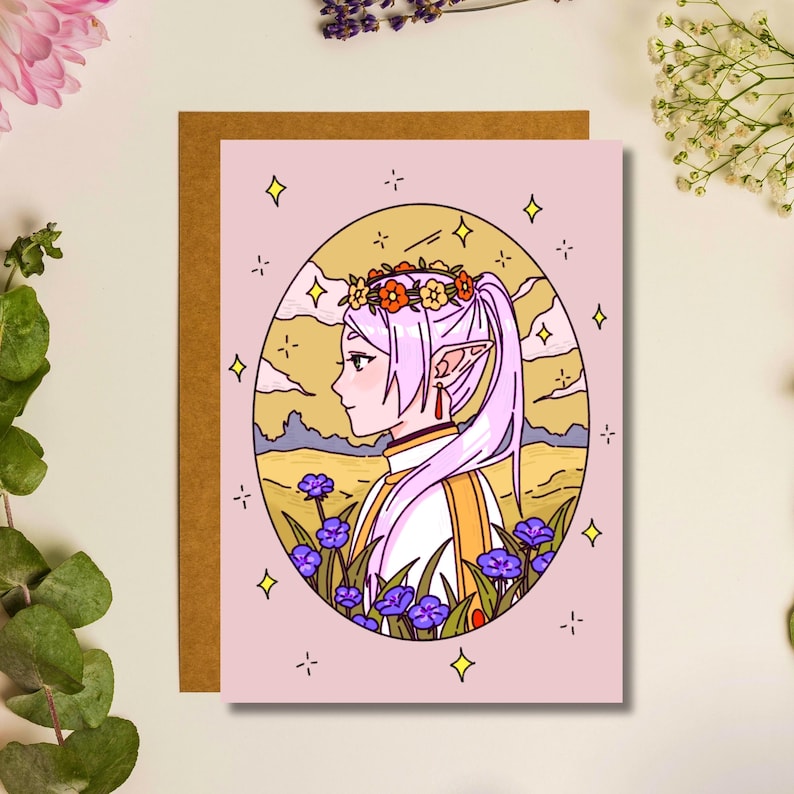 May include: A pink and gold illustration of a person with long purple hair wearing a flower crown and a white and yellow robe. The person is surrounded by purple flowers and stars.