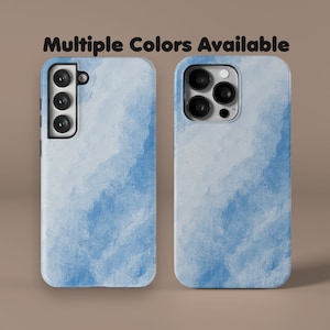 May include: Two phone cases with a blue watercolor design. The cases are for different phone models, one with a single camera and one with a triple camera.