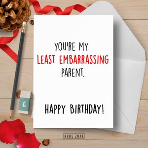 May include: A white card with black text that reads "You're my least embarrassing parent. Happy Birthday!" with the words "Rude Zone" at the bottom.