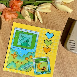 Illustrazione kawaii del Game Boy, videogiochi retrò, Game Boy retrò, nostalgia anni '90, vecchio videogioco, poster di gioco, decorazione geek retrò