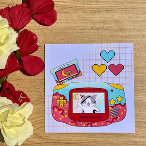 Illustrazione kawaii del Game Boy Advance, videogiochi retrò, console retrò, nostalgia anni '90, poster di videogiochi, arredamento geek retrò, gatto kawaii