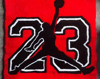 Custom Red and Black Sports-Themed Rug with Dynamic Silhouette