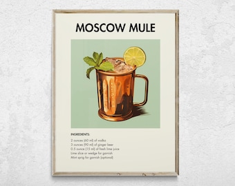 May include: A framed print featuring a Moscow Mule cocktail. The image shows a copper mug filled with ice, garnished with mint and a lime slice. The text "MOSCOW MULE" is at the top, with the ingredients listed below.