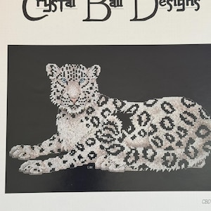 Ulotka z haftem krzyżykowym Snow Leopard
