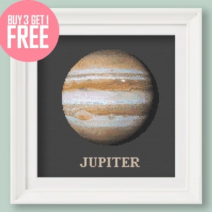 May include: A cross-stitch pattern of Jupiter, the largest planet in our solar system. The planet is depicted in shades of brown, orange, and white, with a dark background. The word "JUPITER" is written in white below the planet.