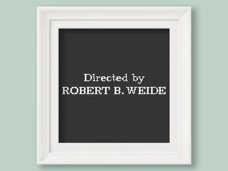May include: A black and white framed print with the text "Directed by ROBERT B. WEIDE" in a white font.