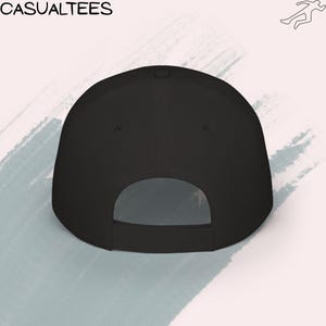 Low-profile baseball cap displaying an FDT graphic with an inverted U.S. flag, representing political dissent and resistance to Trump-era leadership.