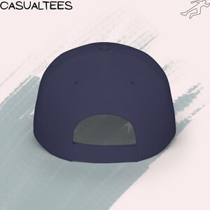 Low-profile baseball cap displaying an FDT graphic with an inverted U.S. flag, representing political dissent and resistance to Trump-era leadership.