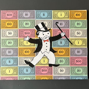 Monopoly money man canvas prints
