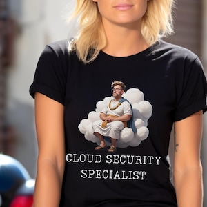 May include: A black t-shirt featuring a graphic of a person sitting on a cloud. The text "CLOUD SECURITY SPECIALIST" is printed below the graphic.