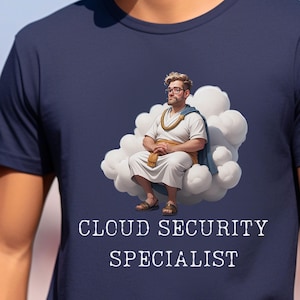 May include: A navy blue t-shirt featuring a graphic of a man sitting on a cloud. The text "CLOUD SECURITY SPECIALIST" is printed below the graphic.