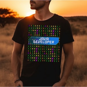 May include: A black t-shirt with a graphic design of binary code and the text "JAVA DEVELOPER" in a blue box.