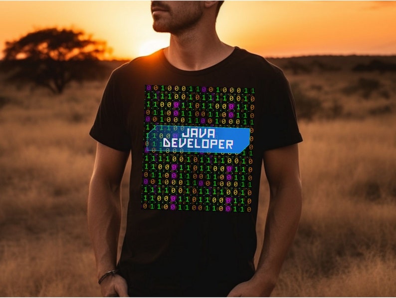 May include: A black t-shirt with a graphic design of binary code and the text "JAVA DEVELOPER" in a blue box.