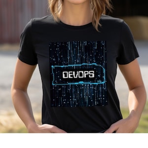 May include: Black t-shirt with a blue and white graphic design. The graphic features the word "DEVOPS" in white, framed by a blue, tech-inspired border. The background of the graphic is a matrix of blue lines and dots.