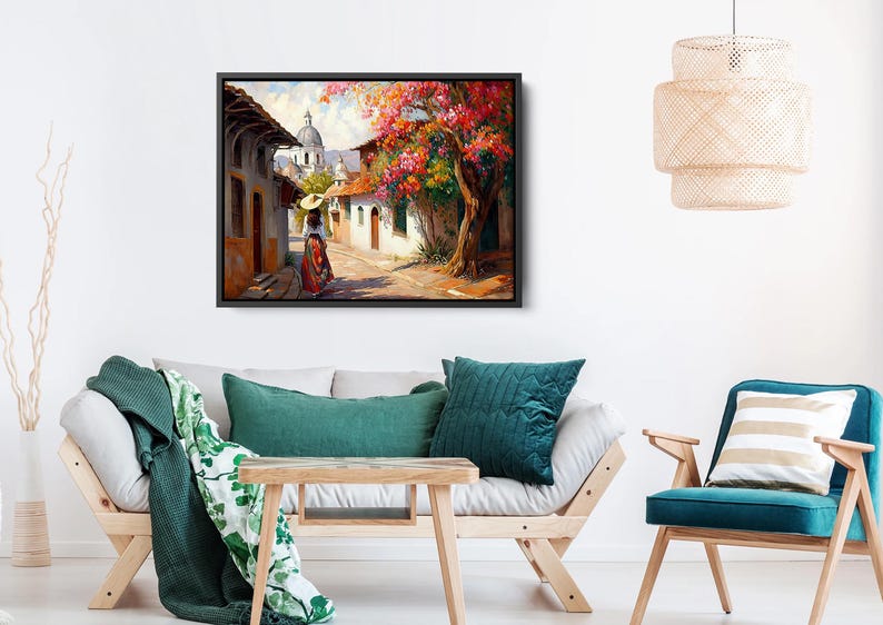 May include: A painting of a woman walking down a street in a small town. The street is lined with colorful buildings and there are trees with pink flowers in bloom. The woman is wearing a long dress and a hat.