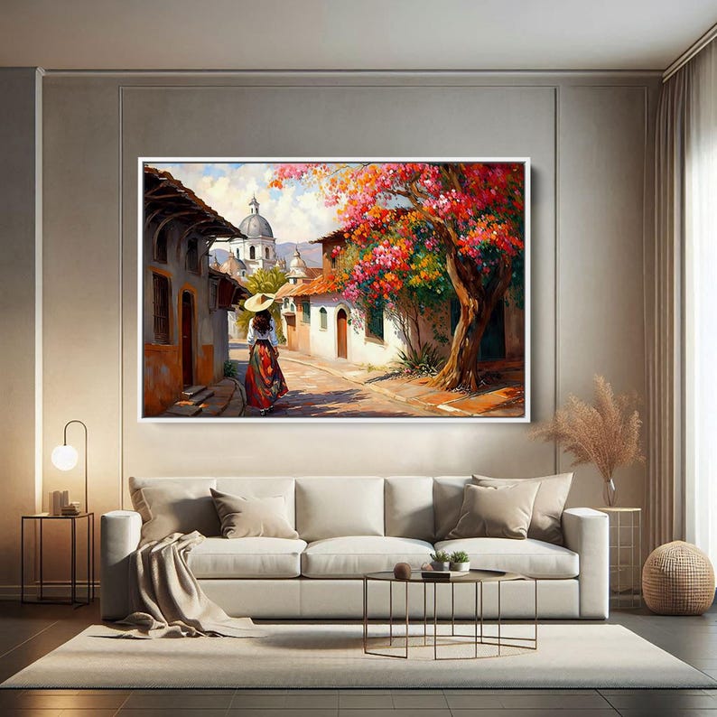 May include: A painting of a woman in a colorful dress walking down a street in a small town. The street is lined with white buildings and there is a large tree with pink flowers in the background.