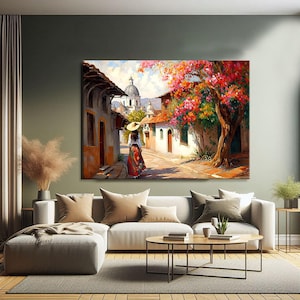 May include: A painting of a woman in a red dress and a straw hat walking down a cobblestone street in a small town. The street is lined with colorful buildings and there are trees with pink flowers in bloom.