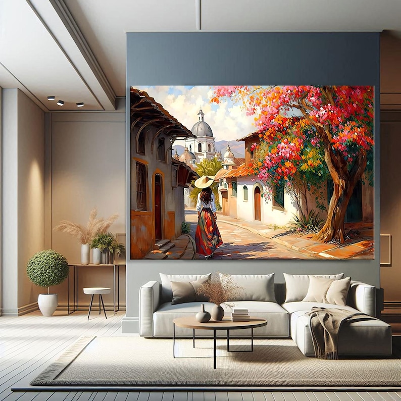 May include: A painting of a woman in a red and white dress walking down a cobblestone street in a small town. The street is lined with colorful buildings and there is a large tree with pink flowers in the background.