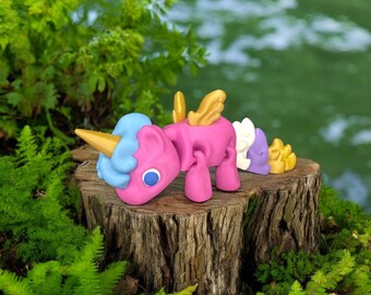 Lindo juguete antiestrés articulado de unicornio impreso en 3D