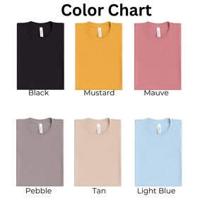 May include: Color chart showing six different t-shirt colors: black, mustard, mauve, pebble, tan, and light blue.
