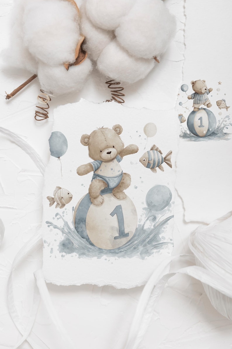 May include: Watercolor illustration of a teddy bear wearing a blue outfit, balancing on a ball with the number 1. The image includes blue balloons and fish, with water splashes, perfect for a baby's first birthday.
