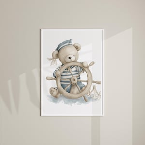 May include: Watercolor illustration of a teddy bear dressed as a sailor, holding a ship's wheel. The bear wears a blue and white striped shirt and hat. A small teddy bear and anchor are also depicted.