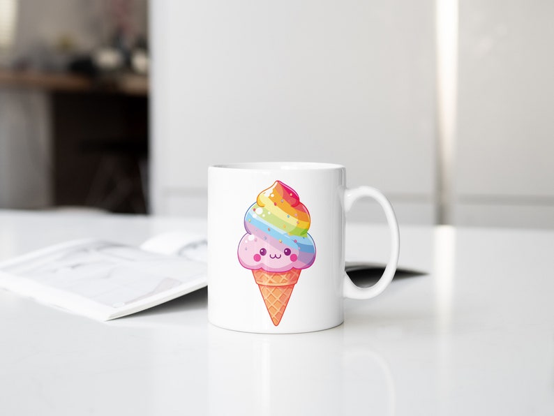 May include: White ceramic mug with a colorful rainbow ice cream cone design. The ice cream cone has a happy face and is decorated with sprinkles.