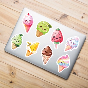 May include: A set of eight colorful ice cream cone stickers with cute faces. The stickers feature different flavors, including strawberry, kiwi, chocolate, and rainbow.