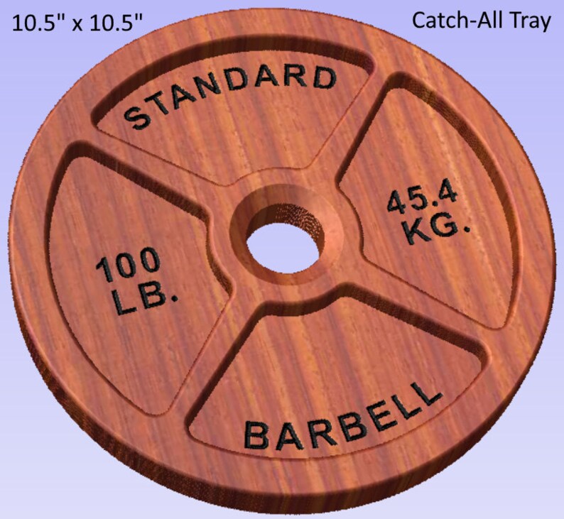 May include: A wooden weight plate with a brown wood grain finish. The plate is 10.5 inches in diameter and has the text "STANDARD", "100 LB.", "45.4 KG.", and "BARBELL" engraved on it. The plate is designed to be used as a catch-all tray.