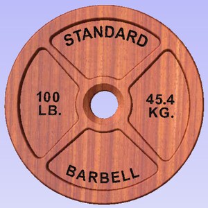 May include: A wooden weight plate for a barbell, with the text "STANDARD BARBELL" and "100 LB. 45.4 KG."