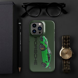 May include: A green phone case with a green Porsche car graphic and the word "PORSCHE" in black text.