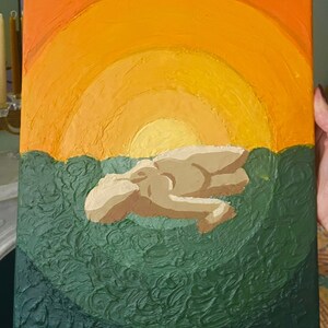 May include: An abstract painting featuring a figure floating in water under a sunset. The sky transitions from orange to yellow, while the water is a textured green. The figure is rendered in shades of beige.