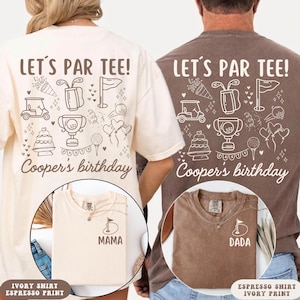 May include: Two t-shirts, one ivory and one espresso, featuring a back graphic with golf icons, a trophy, and the text 'LET'S PAR TEE! Cooper's birthday'. Smaller circular insets show the front of each shirt with a golf flag and 'MAMA' or 'DADA'.
