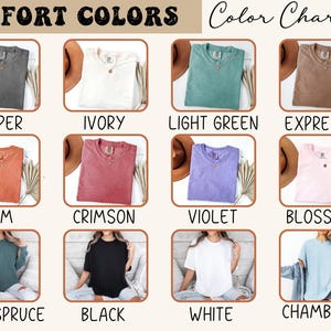 May include: Color chart of Comfort Colors t-shirts in various colors, including Pepper, Ivory, Light Green, Expresso, Yam, Crimson, Violet, Blossom, Blue Spruce, Black, White, and Chambray. Each shirt is displayed with a brown hat and a sprig of dried flowers.