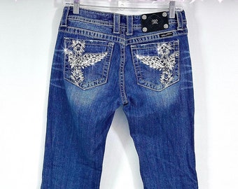 miss me? cross ~ angel wing 2000’s embellished low / mid -rise bootcut jeans. medium wash vintage grunge mcbling styled piece