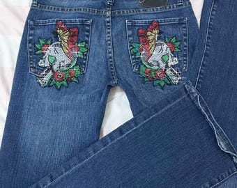 ed hardy 2000s skull graphic embellished low-rise bootcut jeans. flawless grunge ~ gyaru streetwear piece