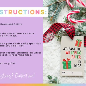 May include: Printable gift tag with a red and white candy cane, red and black plaid ribbon, and a white background. The tag says "At least the wrapping paper is nice." with a small illustration of a wrapped gift box.
