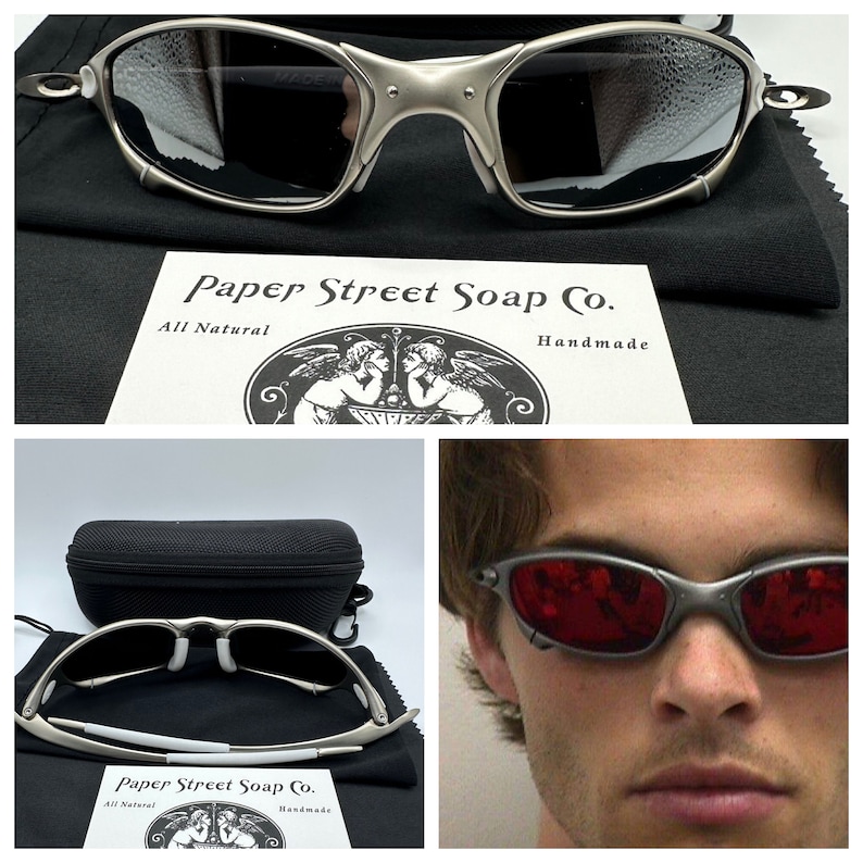 May include: Silver-framed sunglasses with dark lenses, displayed with a black case and cleaning cloth. The image also includes a card with the text "Paper Street Soap Co. All Natural Handmade."