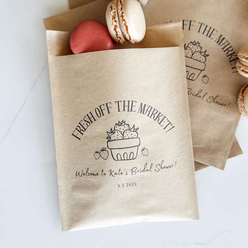 Market shower decor for bridal shower featuring rustic floral arrangements and vintage market signs.