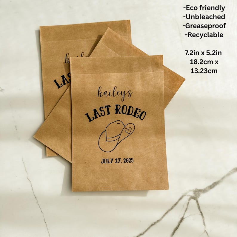 May include: Brown paper bags with the text "kailey's LAST RODEO" and a cowboy hat graphic. The date "JULY 27, 2025" is printed below. The bags are 7.2 inches by 5.2 inches.
